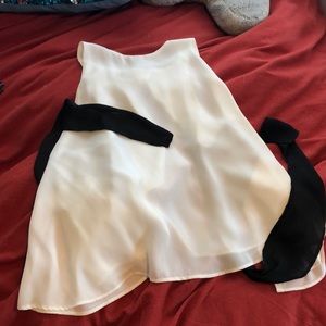 Sleeveless blouse.  Open back.  Elegant. NWOT